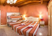 A bed or beds in a room at Hotel Conterie