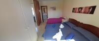 Postel nebo postele na pokoji v ubytování Romantic Sunny Apartment
