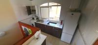 Kuchyň nebo kuchyňský kout v ubytování Romantic Sunny Apartment