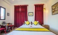 Quynh Chau Homestay Hội Anにあるベッド