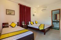 Quynh Chau Homestay Hội Anにあるベッド