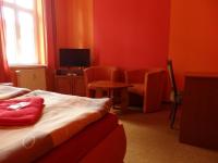 TV a/nebo společenská místnost v ubytování Hotel Zlatý Kříž