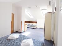 Postel nebo postele na pokoji v ubytování Hotel Atos