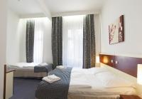 Postel nebo postele na pokoji v ubytování Hotel Atos
