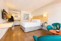 Ένα ή περισσότερα κρεβάτια σε δωμάτιο στο The Thunderbird Inn