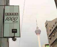 ホテル 1000 マイルズに飾ってある許可証、賞状、看板またはその他の書類