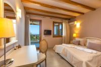 Posteľ alebo postele v izbe v ubytovaní Kallisti Villas, Family Paradise, By ThinkVilla