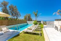 Bazén v ubytovaní Kallisti Villas, Family Paradise, By ThinkVilla alebo v jeho blízkosti