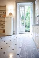 A kitchen or kitchenette at The Como Secret Garden