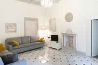A seating area at The Como Secret Garden
