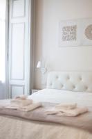 A bed or beds in a room at The Como Secret Garden