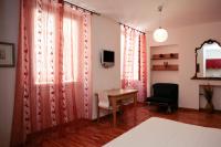 A bed or beds in a room at La Giara del Centro