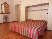 A bed or beds in a room at La Giara del Centro