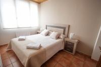 Postel nebo postele na pokoji v ubytování Apartamentos Mirador de Gúdar