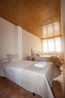 Postel nebo postele na pokoji v ubytování Apartamentos Mirador de Gúdar