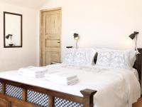 Posteľ alebo postele v izbe v ubytovaní AFOURA HOUSES by K&K