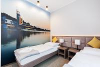 Postel nebo postele na pokoji v ubytování Meet Poznań Hotel