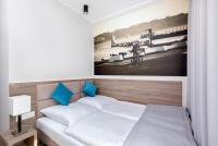 Postel nebo postele na pokoji v ubytování Meet Poznań Hotel