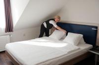 Hotel Alexander Zurich Old Townにあるベッド