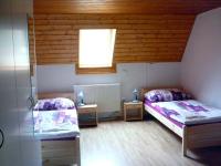 Postel nebo postele na pokoji v ubytování Ubytování nad Bisonem