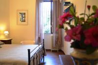 A bed or beds in a room at Villa Siciliana