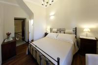 A bed or beds in a room at Villa Siciliana