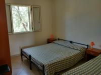 A bed or beds in a room at Tenuta Montincello