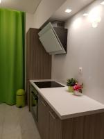 Kuchyňa alebo kuchynka v ubytovaní Laura Aristotelous Square Apartment