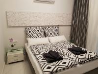 Posteľ alebo postele v izbe v ubytovaní Laura Grande Apartment