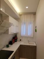 Kuchyňa alebo kuchynka v ubytovaní Laura Grande Apartment