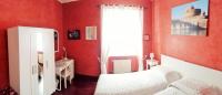 A bed or beds in a room at CiaoRoma!