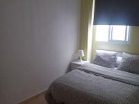 Postel nebo postele na pokoji v ubytování Apartamento Ciudad de las Ciencias