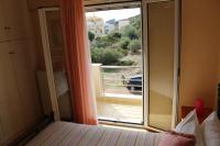 Postel nebo postele na pokoji v ubytování Helen's Sounio Apartments