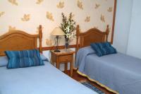 Posteľ alebo postele v izbe v ubytovaní Hotel Casa Marchena