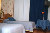 Posteľ alebo postele v izbe v ubytovaní Hotel Casa Marchena