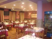 Reštaurácia alebo iné gastronomické zariadenie v ubytovaní Hotel Casa Marchena