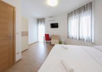 Postel nebo postele na pokoji v ubytování Guesthouse Villa Klara
