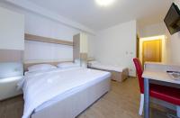 Postel nebo postele na pokoji v ubytování Guesthouse Villa Klara