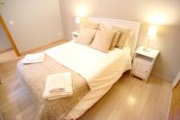 Postel nebo postele na pokoji v ubytování Sleepin Sevilla Arenal