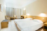 Posteľ alebo postele v izbe v ubytovaní Hotel Riviera
