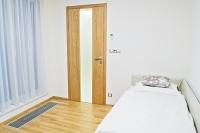 Postel nebo postele na pokoji v ubytování Rezidence Muzeum