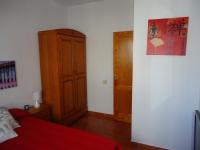 Postel nebo postele na pokoji v ubytování Apartamentos Flor del Cotillo