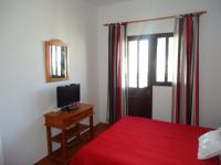 TV a/nebo společenská místnost v ubytování Apartamentos Flor del Cotillo