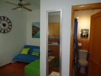 Postel nebo postele na pokoji v ubytování Apartamentos Flor del Cotillo