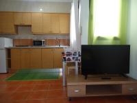 Kuchyň nebo kuchyňský kout v ubytování Apartamentos Flor del Cotillo