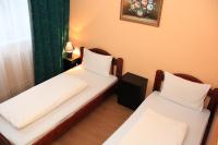 Posteľ alebo postele v izbe v ubytovaní Hotel Ózd