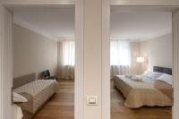 Posteľ alebo postele v izbe v ubytovaní Flats4rent