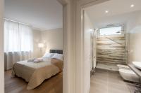 Posteľ alebo postele v izbe v ubytovaní Flats4rent