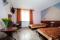 Łóżko lub łóżka w pokoju w obiekcie Hotel Irys