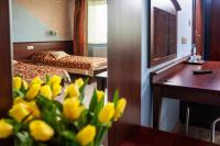 Łóżko lub łóżka w pokoju w obiekcie Hotel Irys